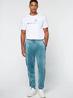Hot Debossed Damarindo Velour Track Pant- Larkspur Pants And Sweatpants